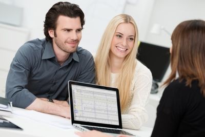 Husband and wife meeting with lawyer