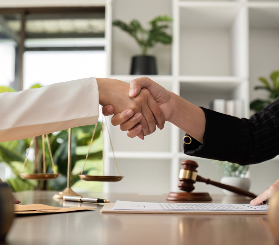 two lawyers handshaking